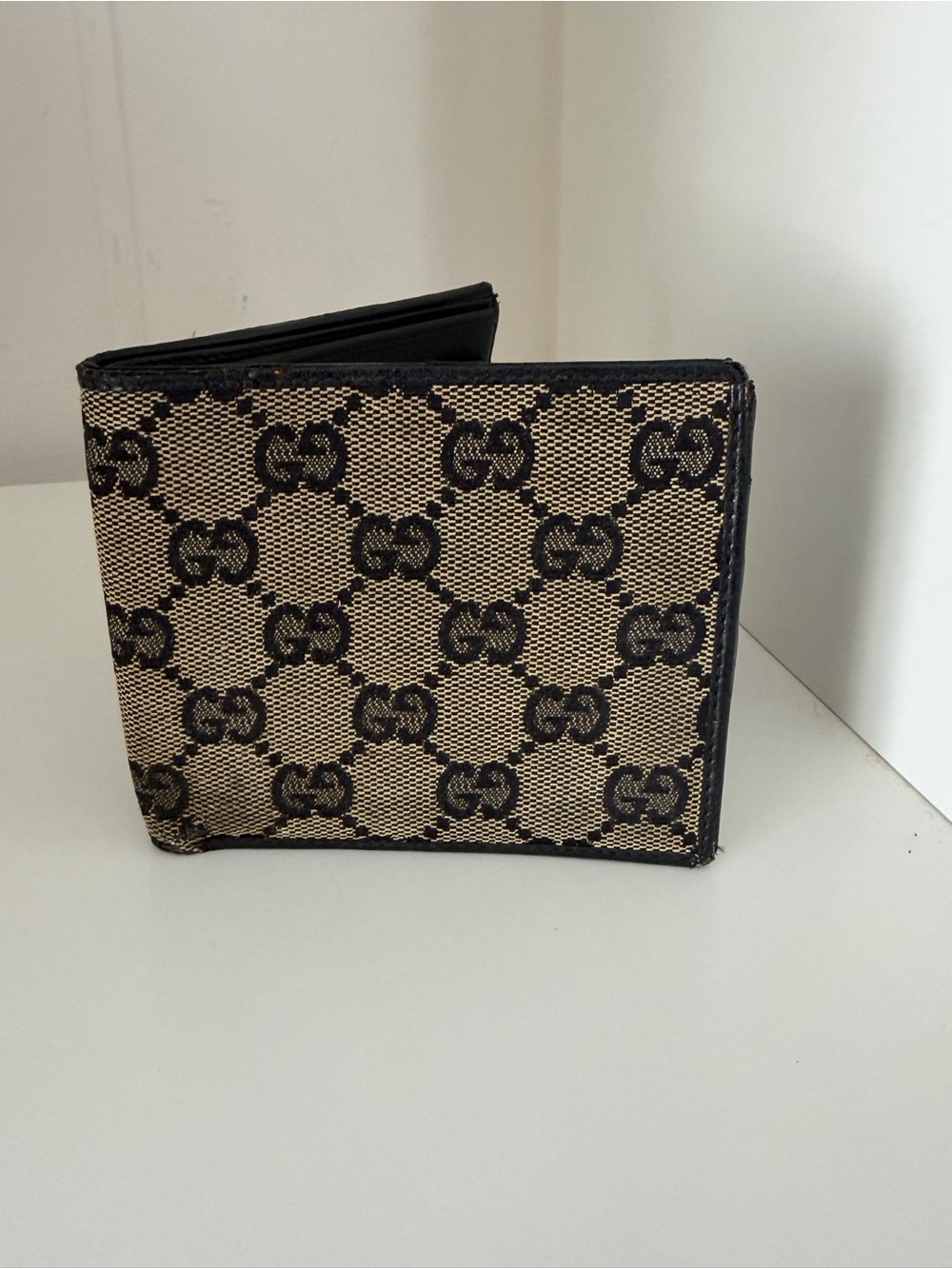 Authentic vintage Gucci GG Monogram Canvas Bifold Wallet crafted in Italy